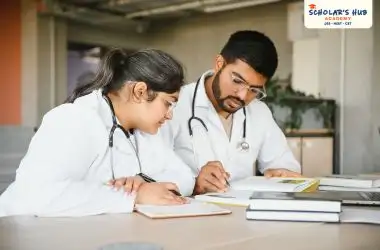 A boy and girl doctor students studying together.